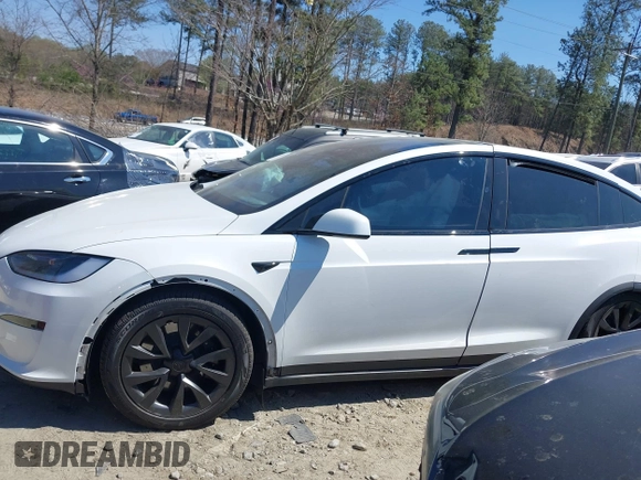 2023 Tesla Model X with VIN 7SAXCDE50PF414198, listed as a IAAI auction lot 41880957 with Not Provided miles and . Bid and sale history available at DreamBid. Image 13.