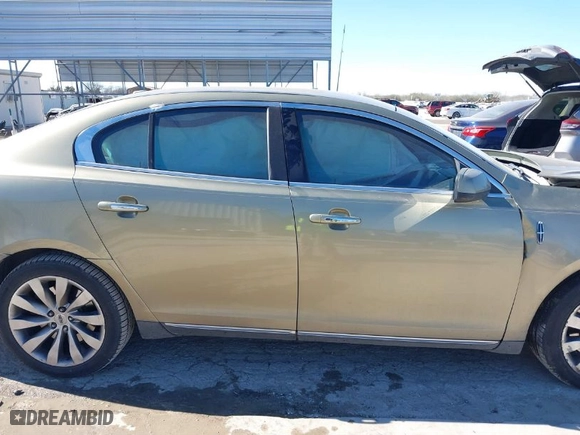 2013 Lincoln MKS with VIN 1LNHL9DK6DG606440, listed as a IAAI auction lot 41378327 with 190192 miles. Bid and sale history available at carsss.com. Image 13.