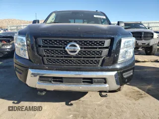 2021 Nissan Titan XD SV with VIN 1N6AA1FB9MN517657, listed as a Copart auction lot 79363644 with 100,628 mi miles and Salvage Title. Bid and sale history available at carsss.com. Image 5.