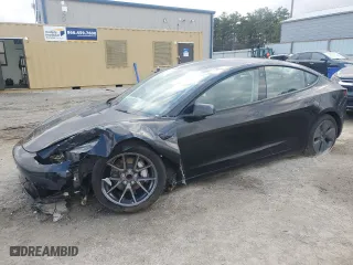2023 Tesla Model 3 with VIN 5YJ3E1EAXPF435674, listed as a Copart auction lot 44305385 with 28,948 mi miles and Salvage Title. Bid and sale history available at carsss.com. Image 1.