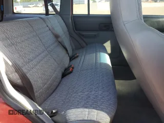 1998 Jeep Cherokee Sport with VIN 1J4FJ68S3WL167809, listed as a Copart auction lot 53829645 with Not provided miles and Salvage title. Bid and sale history available at DreamBid. Image 11.