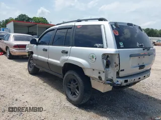 2002 Jeep Grand Cherokee Laredo with VIN 1J4GX48S32C288387, listed as a IAAI auction lot 42212249 with 151,028 mi miles and . Bid and sale history available at DreamBid. Image 3.