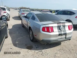 2012 Ford Mustang Premium with VIN 1ZVBP8AM5C5234532, listed as a IAAI auction lot 41860791 with 106,929 mi miles and . Bid and sale history available at DreamBid. Image 3.