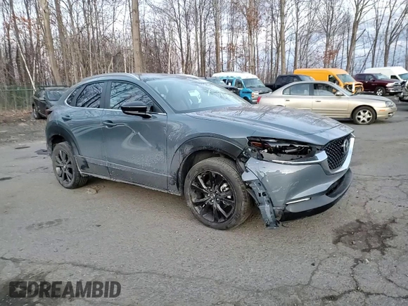 2023 Mazda CX-30 S Carbon Edition с VIN 3MVDMBCM3PM500403, выставлен на аукционе Copart как лот 88146095 с пробегом 29 861 миль миль и Списание • Salvage title. История ставок и продаж доступна на DreamBid. Изображение 11.