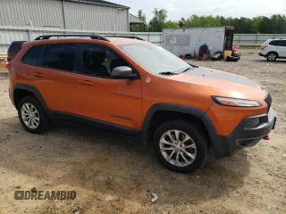 2015 Jeep Cherokee Trailhawk with VIN 1C4PJMBB5FW600455, listed as a Copart auction lot 53859365 with 164,420 mi miles and Salvage Title. Bid and sale history available at DreamBid. Image 4.