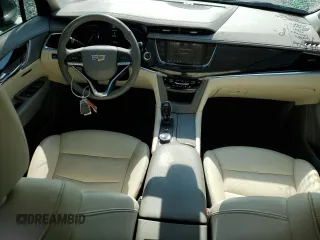 2021 Cadillac XT6 Premium Luxury z VIN 1GYKPCRS5MZ197527, wystawiony jako Copart lot #55952185 z przebiegiem 24 856 mil mil oraz Szkody całkowita. Historia ofert i sprzedaży dostępna na DreamBid. Obrazek 8.