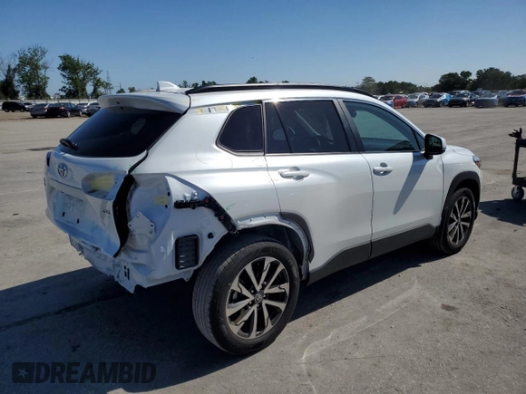 2023 Toyota Corolla Cross XLE с VIN 7MUDAAAG2PV070208, выставлен на аукционе Copart как лот 52105375 с пробегом 20 643 миль миль и Списание • Salvage title. История ставок и продаж доступна на DreamBid. Изображение 3.
