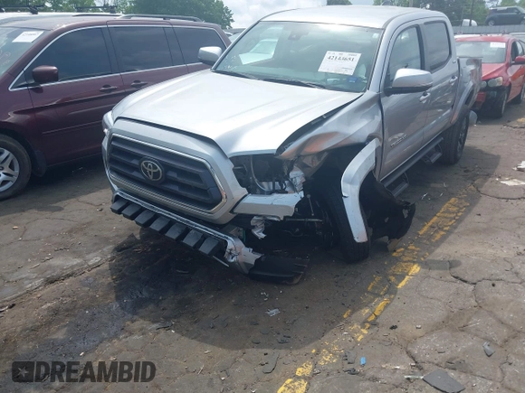 2023 Toyota Tacoma SR with VIN 3TYCZ5AN2PT176554, listed as a IAAI auction lot 42148651 with 15,255 mi miles and . Bid and sale history available at DreamBid. Image 6.