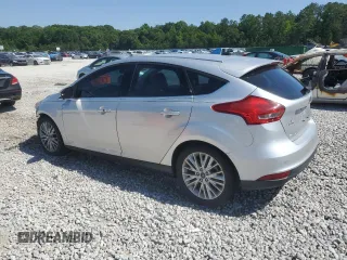 2018 Ford Focus Titanium with VIN 1FADP3N24JL326253, listed as a Copart auction lot 57757835 with 75,579 mi miles and Salvage title. Bid and sale history available at DreamBid. Image 2.