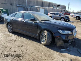 2017 Lincoln MKZ Hybrid Premiere with VIN 3LN6L5KU6HR611530, listed as a Copart auction lot 45193635 with 121,560 mi miles and Salvage Title. Bid and sale history available at carsss.com. Image 4.