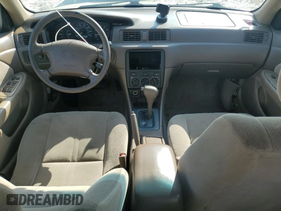 2001 Toyota Camry CE z VIN 4T1BG22KX1U774132, wystawiony jako Copart lot #57632885 z przebiegiem 179 771 mil mil oraz Szkoda całkowita • Salvage title. Historia ofert i sprzedaży dostępna na DreamBid. Obrazek 8.