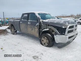 2014 Ram 2500 SLT with VIN 3C6TR5JT5EG203839, listed as a IAAI auction lot 41277795 with 135,344 mi miles and . Bid and sale history available at DreamBid. Image 1.