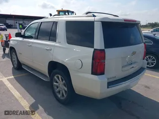 2015 Chevrolet Tahoe LTZ with VIN 1GNSCCKC4FR142856, listed as a IAAI auction lot 39886899 with 134,301 mi miles. Bid and sale history available at carsss.com. Image 3.