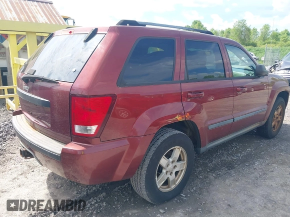 2007 Jeep Grand Cherokee Laredo z VIN 1J8HR48N87C609080, wystawiony jako IAAI lot #42391793 z przebiegiem 159 096 mil mil oraz . Historia ofert i sprzedaży dostępna na DreamBid. Obrazek 4.