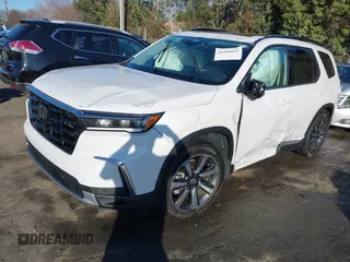 2024 Honda Pilot Touring with VIN 5FNYG2H7XRB016877, listed as a IAAI auction lot 41496013 with 18,213 mi miles and . Bid and sale history available at DreamBid. Image 2.