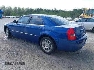 2009 Chrysler 300 LX with VIN 2C3KA43D69H614978, listed as a IAAI auction lot 41966879 with 247,871 mi miles. Bid and sale history available at carsss.com. Image 3.