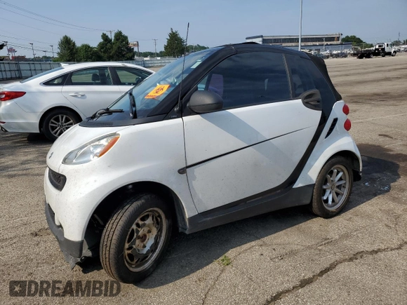 2009 Smart fortwo Passion with VIN WMEEK31XX9K279585, listed as a Copart auction lot 64770805 with Not provided miles and Salvage title. Bid and sale history available at DreamBid. Image 1.