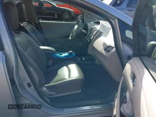 2011 Nissan LEAF SL-e z VIN JN1AZ0CP2BT008771, wystawiony jako IAAI lot #39745384 z przebiegiem 64 758 mil mil oraz . Historia ofert i sprzedaży dostępna na DreamBid. Obrazek 5.