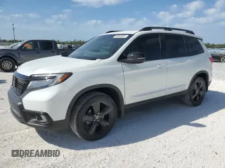 2019 Honda Passport Elite with VIN 5FNYF8H00KB025599, listed as a Copart auction lot 50992635 with 49,829 mi miles and Salvage Title. Bid and sale history available at carsss.com. Image 1.