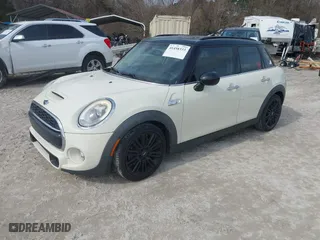 2017 MINI Hardtop 4 Door Cooper S with VIN WMWXU3C54H2D32602, listed as a IAAI auction lot 41458333 with 124235 miles. Bid and sale history available at carsss.com. Image 17.