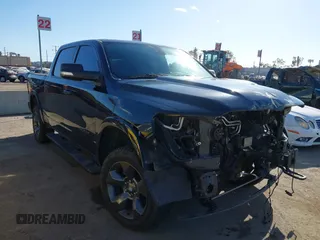 2020 Ram 1500 Big Horn with VIN 1C6SRFFT4LN308113, listed as a IAAI auction lot 41705156 with 69,207 mi miles and . Bid and sale history available at DreamBid. Image 1.