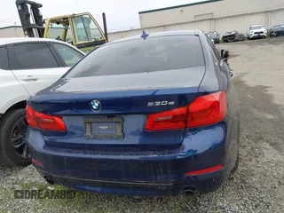 2019 BMW 5 Series 530e iPerformance with VIN WBAJA9C59KB389898, listed as a IAAI auction lot 41479595 with 90,965 mi miles. Bid and sale history available at carsss.com. Image 16.