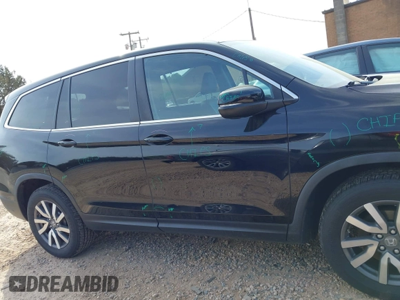 2021 Honda Pilot EX-L with VIN 5FNYF6H57MB064595, listed as a IAAI auction lot 41942327 with 46,150 mi miles and . Bid and sale history available at DreamBid. Image 13.