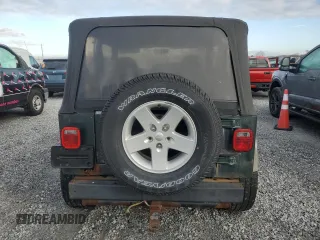 2002 Jeep Wrangler Sport with VIN 1J4FA49SX2P726553, listed as a Copart auction lot 42559245 with 198,584 mi miles and Clean Title. Bid and sale history available at carsss.com. Image 6.