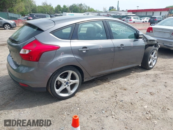 2014 Ford Focus Titanium with VIN 1FADP3N20EL422693, listed as a IAAI auction lot 42060024 with 97,371 mi miles and . Bid and sale history available at DreamBid. Image 4.