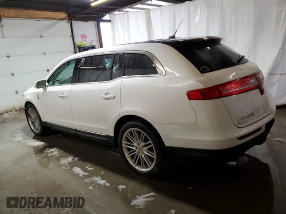 2016 Lincoln MKT EcoBoost z VIN 2LMHJ5AT8GBL01646, wystawiony jako Copart lot #85357264 z przebiegiem 77 066 mil mil oraz Szkoda całkowita • Salvage title. Historia ofert i sprzedaży dostępna na DreamBid. Obrazek 2.
