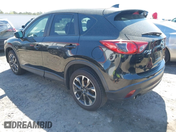 2016 Mazda CX-5 Grand Touring with VIN JM3KE4DY9G0893174, listed as a IAAI auction lot 41887814 with 79,811 mi miles. Bid and sale history available at carsss.com. Image 3.