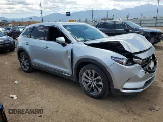 2016 Mazda CX-9 Grand Touring с VIN JM3TCADY2G0121026, выставлен на аукционе Copart как лот 60518105 с пробегом 104 923 миль миль и Списание • Salvage title. История ставок и продаж доступна на DreamBid. Изображение 4.