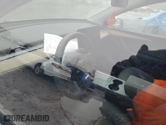 2023 Tesla Model Y Long Range z VIN 7SAYGDEE1PA114563, wystawiony jako Copart lot #44423505 z przebiegiem Nie podano mil oraz Szkody całkowita. Historia ofert i sprzedaży dostępna na DreamBid. Obrazek 9.