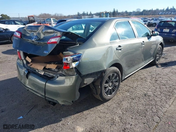 2013 Toyota Camry Hybrid LE with VIN 4T1BD1FK2DU094842, listed as a IAAI auction lot 41436192 with 136,647 mi miles. Bid and sale history available at carsss.com. Image 4.
