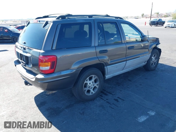 1999 Jeep Grand Cherokee Laredo with VIN 1J4GW58N2XC652678, listed as a IAAI auction lot 42290732 with 145,602 mi miles and . Bid and sale history available at DreamBid. Image 4.