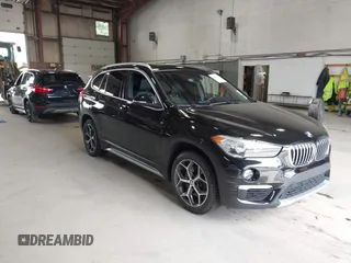 2018 BMW X1 xDrive28i with VIN WBXHT3C38J5L29750, listed as a IAAI auction lot 42631203 with 107,798 mi miles and . Bid and sale history available at DreamBid. Image 1.