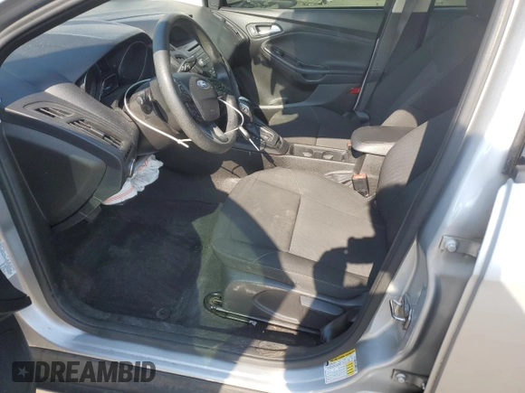 2015 Ford Focus SE with VIN 1FADP3F2XFL321208, listed as a Copart auction lot 61413005 with 139,439 mi miles and Salvage title. Bid and sale history available at DreamBid. Image 7.