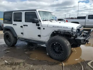 2017 Jeep Wrangler Unlimited Rubicon z VIN 1C4BJWFG5HL511601, wystawiony jako Copart lot #48223945 z przebiegiem 86 465 mil mil oraz Szkoda całkowita • Salvage title. Historia ofert i sprzedaży dostępna na DreamBid. Obrazek 4.