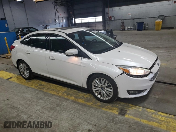2017 Ford Focus Titanium with VIN 1FADP3J25HL213184, listed as a Copart auction lot 61653155 with 120,883 mi miles and Clean title. Bid and sale history available at DreamBid. Image 4.