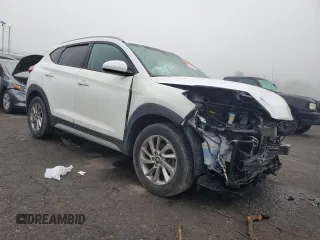2018 Hyundai Tucson SEL with VIN KM8J3CA41JU712523, listed as a Copart auction lot 56929885 with 91,131 mi miles and Salvage title. Bid and sale history available at DreamBid. Image 4.