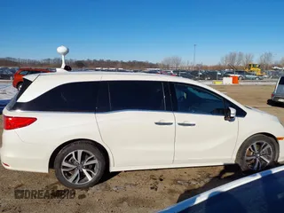 2018 Honda Odyssey Elite with VIN 5FNRL6H97JB039191, listed as a IAAI auction lot 41625687 with 54,363 mi miles and . Bid and sale history available at DreamBid. Image 13.