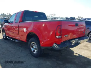 2002 Ford F-150 XL with VIN 1FTRX17W52NA81828, listed as a IAAI auction lot 41450811 with 201,948 mi miles. Bid and sale history available at carsss.com. Image 3.