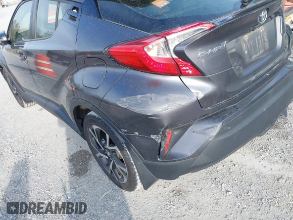 2019 Toyota C-HR XLE z VIN JTNKHMBX0K1013522, wystawiony jako IAAI lot #42053511 z przebiegiem 136 330 mil mil oraz . Historia ofert i sprzedaży dostępna na DreamBid. Obrazek 18.