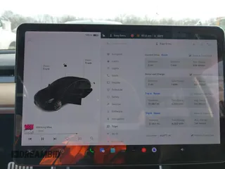 2018 Tesla Model 3 Long Range Battery with VIN 5YJ3E1EB5JF063077, listed as a IAAI auction lot 41773551 with 99,477 mi miles and . Bid and sale history available at DreamBid. Image 7.