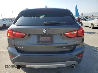 2018 BMW X1 sDrive28i with VIN WBXHU7C35J5L09783, listed as a Copart auction lot 55147935 with 37,114 mi miles and Salvage Title. Bid and sale history available at DreamBid. Image 6.