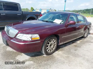 2006 Lincoln Town Car Signature z VIN 1LNHM81V06Y649934, wystawiony jako IAAI lot #42143662 z przebiegiem 147 534 mil mil oraz . Historia ofert i sprzedaży dostępna na DreamBid. Obrazek 2.