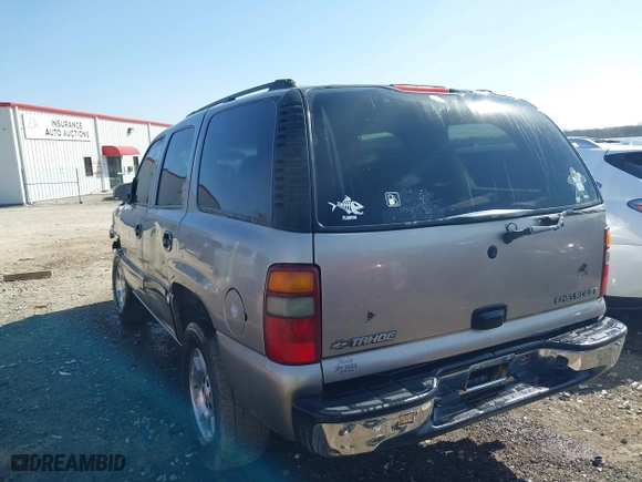 2003 Chevrolet Tahoe LS with VIN 1GNEC13V13J298445, listed as a IAAI auction lot 41728848 with 226,727 mi miles. Bid and sale history available at carsss.com. Image 3.