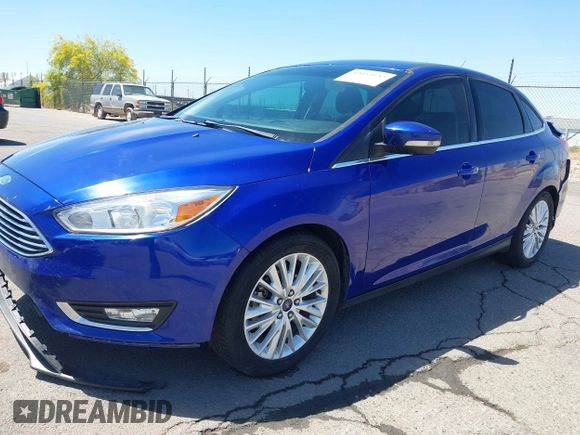 2015 Ford Focus Titanium with VIN 1FADP3J25FL314903, listed as a IAAI auction lot 42053132 with 125,418 mi miles and . Bid and sale history available at carsss.com. Image 18.