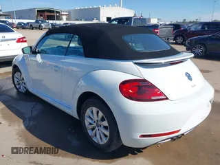 2019 Volkswagen Beetle S with VIN 3VW5DAAT0KM507437, listed as a IAAI auction lot 41380821 with 28,010 mi miles and . Bid and sale history available at DreamBid. Image 3.