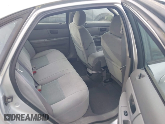 2004 Ford Taurus z VIN 1FAFP52224G180277, wystawiony jako IAAI lot #42091016 z przebiegiem 43 629 mil mil oraz . Historia ofert i sprzedaży dostępna na DreamBid. Obrazek 8.